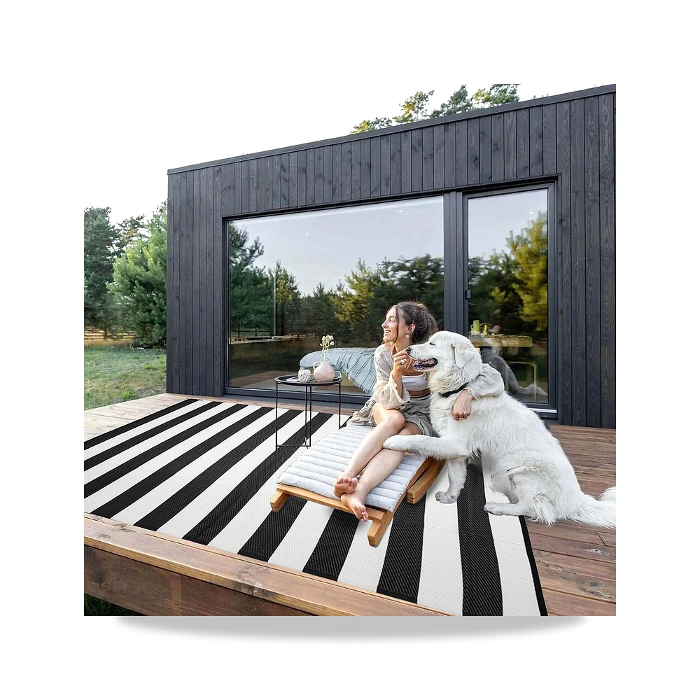 صورة منتج سجادة خارجية منزلية من ستريكلاند، 6 × 9 قدم، بلاستيكية للفناء، اسود Strickland Home – المقاس 6’x9′ – نوع المادة الخلفية بولي فينيل كلوريد - كود الصنف reemco-2027-1862052 - ماركة يباع من خلال reemco - توريد وتصوير حصري لشركة ريمكو القابضة السعودية