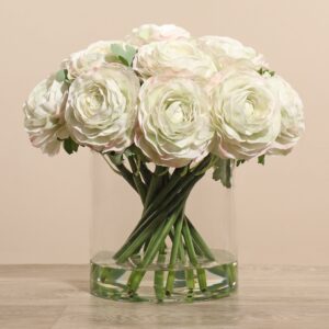 تشكيلة حوذان صناعية في مزهرية زجاجية