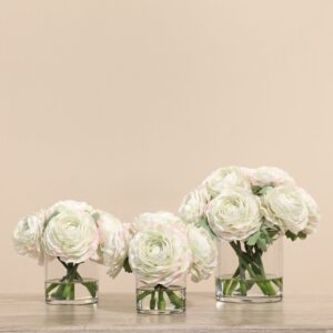 مجموعة حوذان صناعية في مزهرية زجاجية