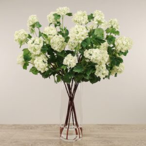 مزهرية زجاجية مع تنسيق كرات ثلج صناعية