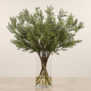 باقة زهور السيدوم في مزهرية زجاجية