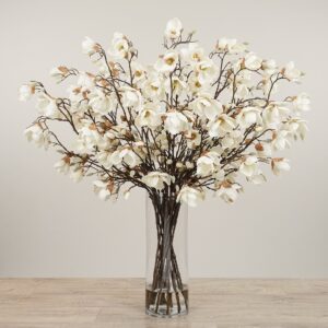 باقة ماغنوليا صناعية في مزهرية زجاجية