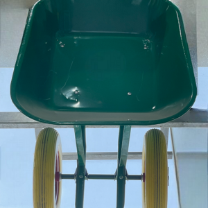 Locally manufactured two-wheeled foam construction vehicle