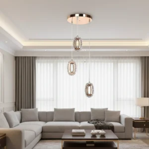 Modern chandelier, gold, nickel, chrome finish, with three 12W bulbs.